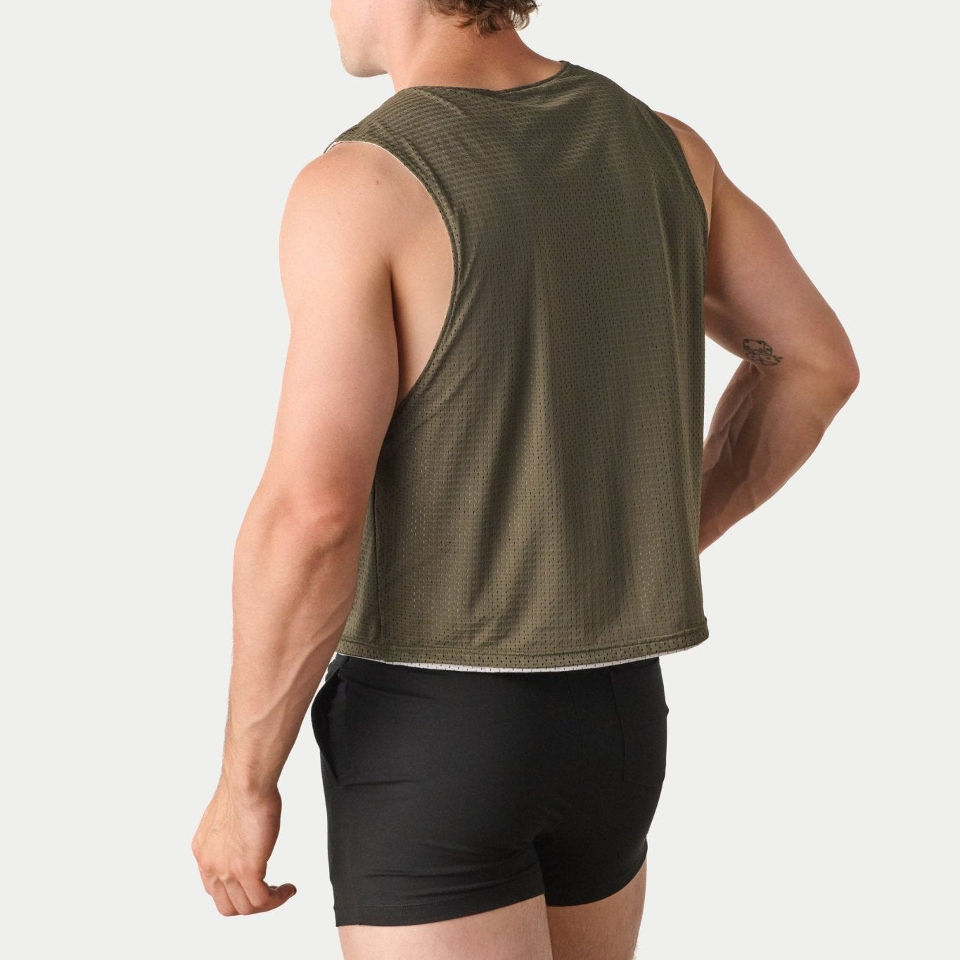 Awry Rookie Reversible Tank Army Green & Gray — side view showing semi-cropped silhouette and mesh construction