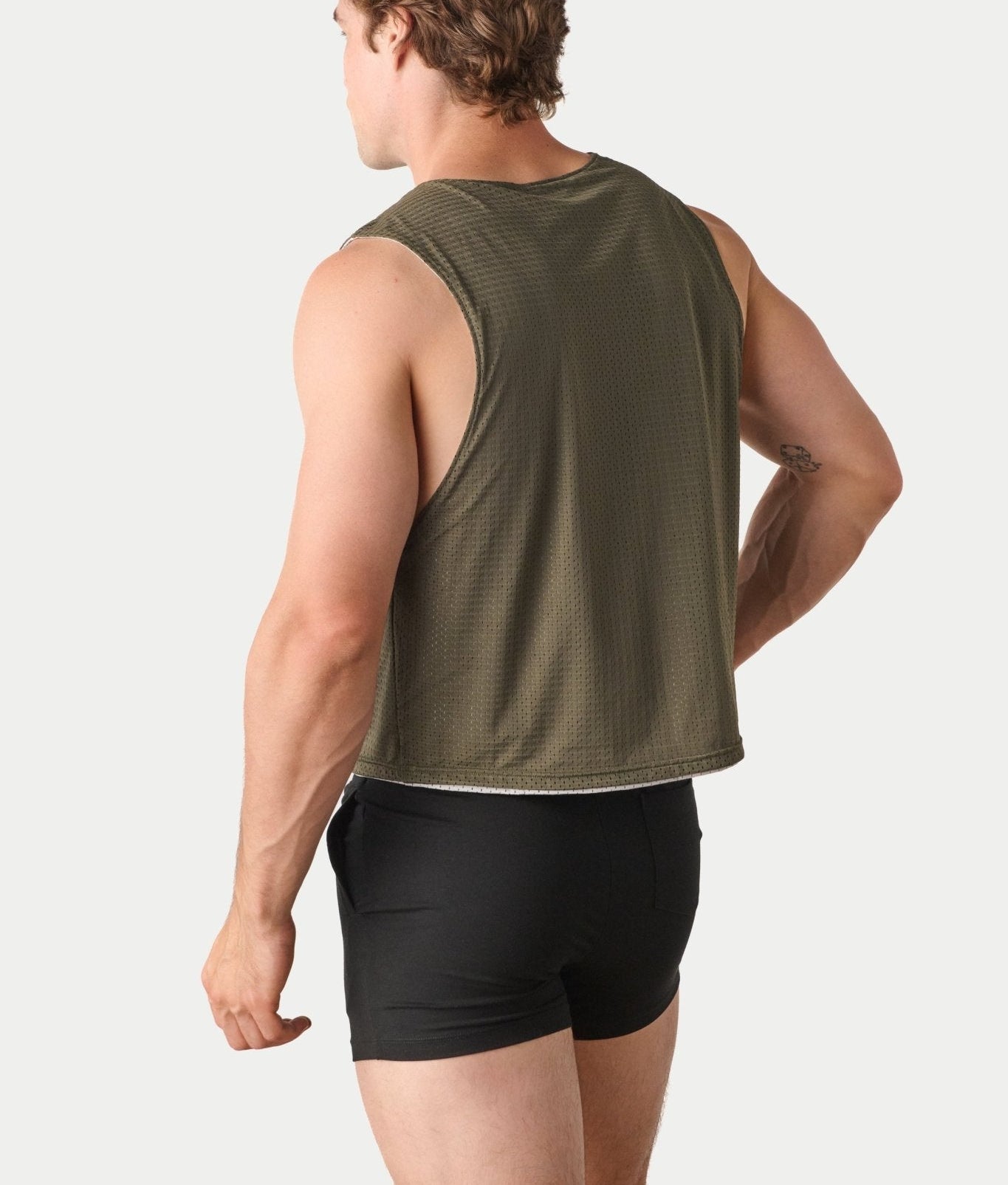 Awry Rookie Reversible Tank Army Green & Gray — side view showing semi-cropped silhouette and mesh construction