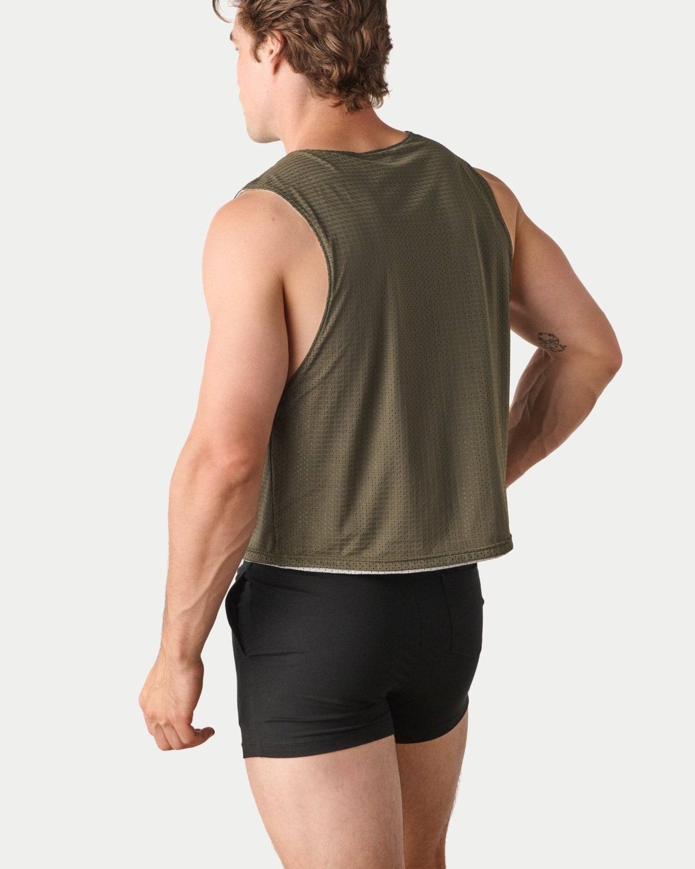 Awry Rookie Reversible Tank Army Green & Gray — side view showing semi-cropped silhouette and mesh construction