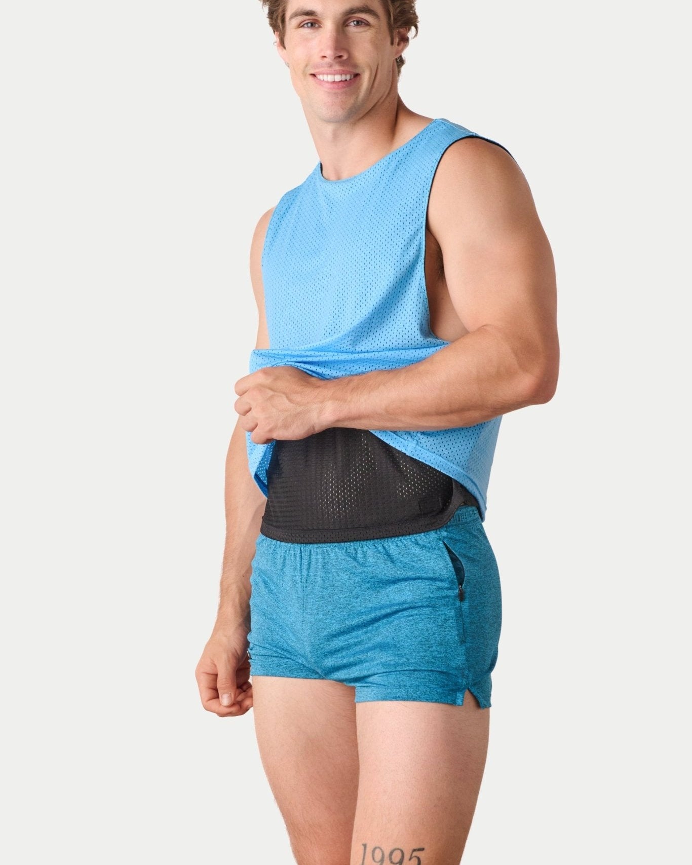 Awry Rookie Reversible Tank Black & Blue — detail of reversible mesh fabric and basketball jersey-inspired design