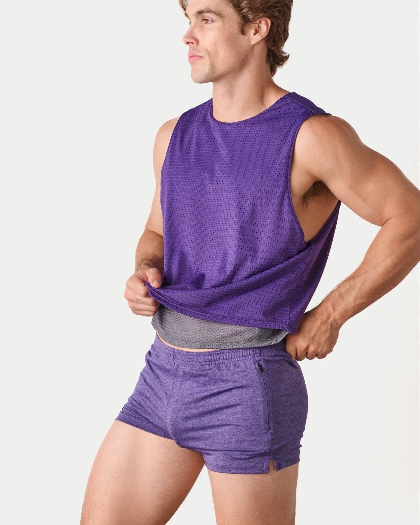 Awry Rookie Reversible Tank Purple & Slate — side view showing semi-cropped silhouette and mesh construction