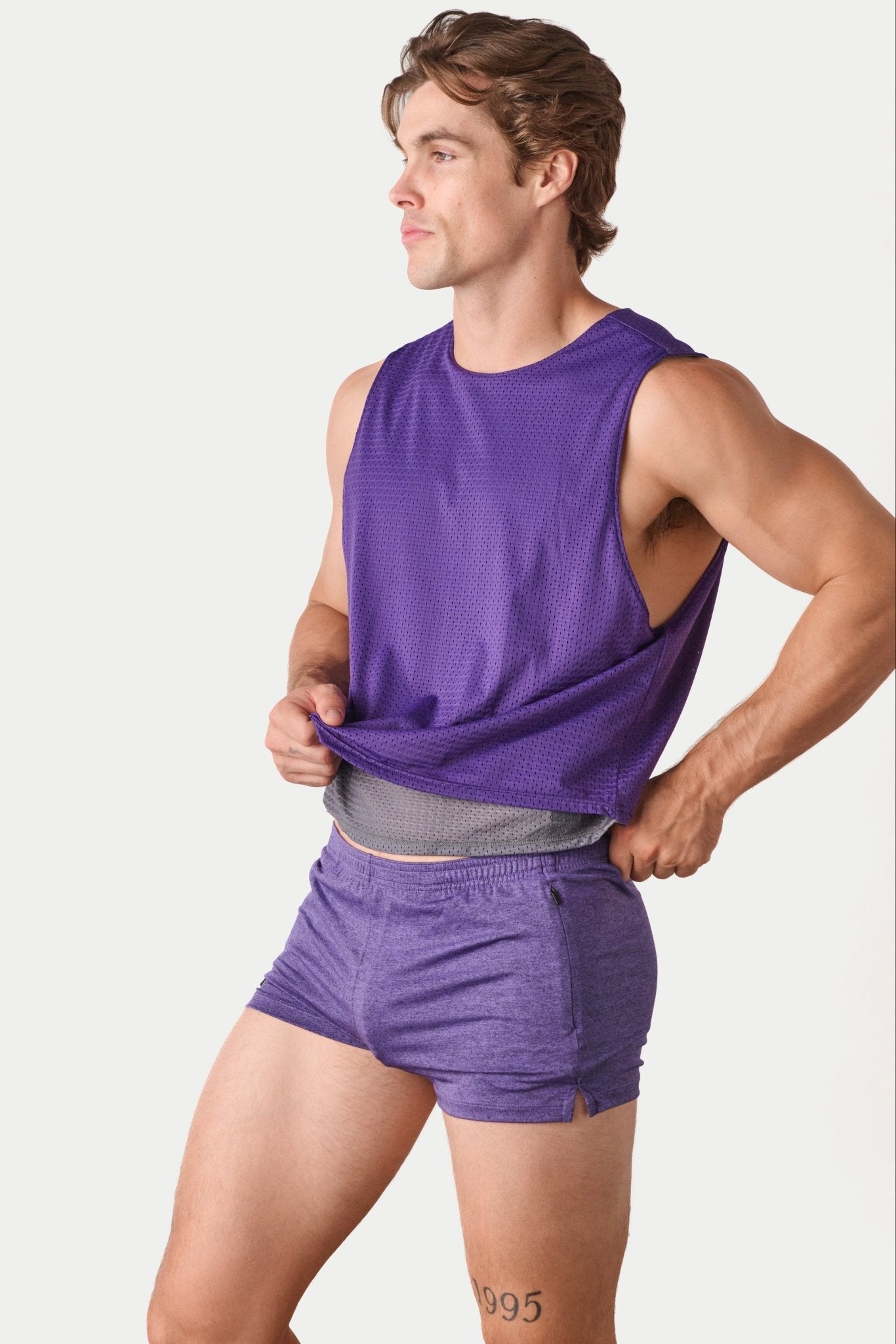 Awry Rookie Reversible Tank Purple & Slate — side view showing semi-cropped silhouette and mesh construction