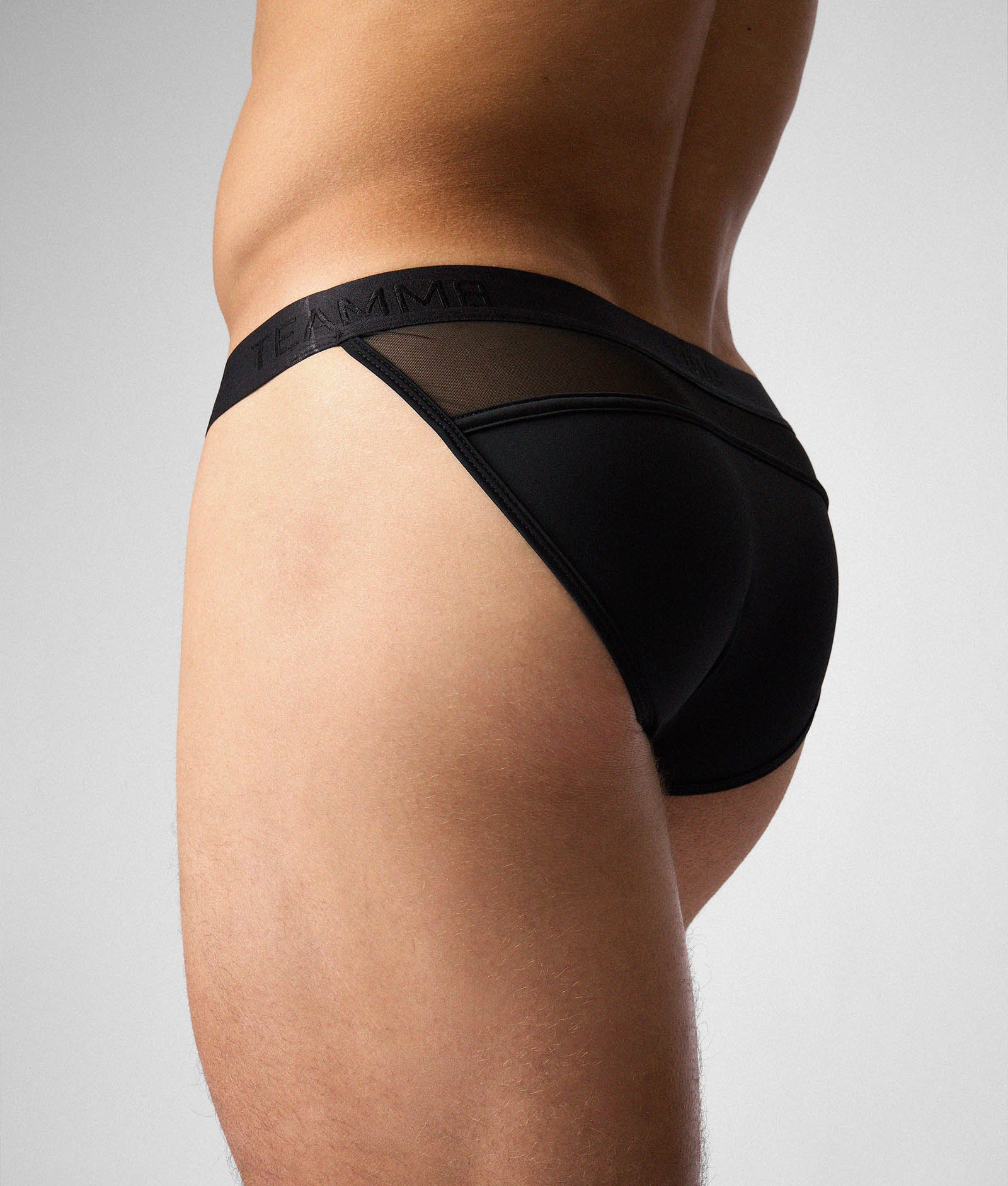 Teamm8 Score Sheer Sports Brief Onyx - low-rise sports brief with sheer mesh panel side view