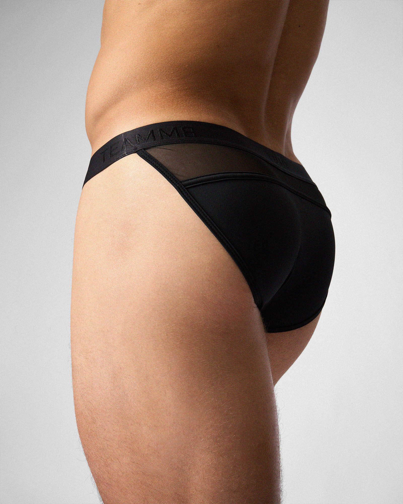 Teamm8 Score Sheer Sports Brief Onyx - low-rise sports brief with sheer mesh panel side view