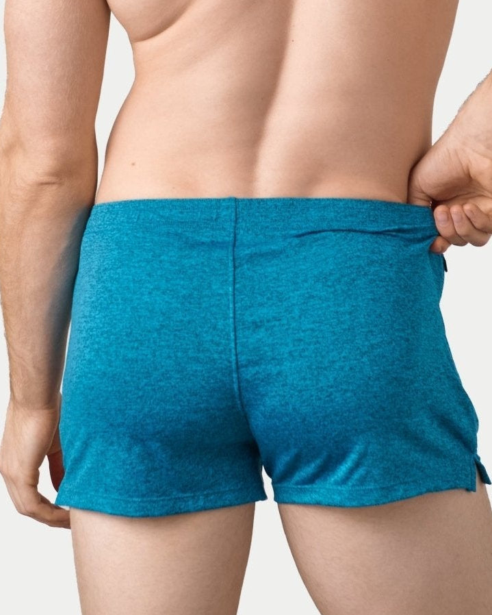 Awry Static Short Azure — side view showing hidden zipper pocket and clean elastic waistband