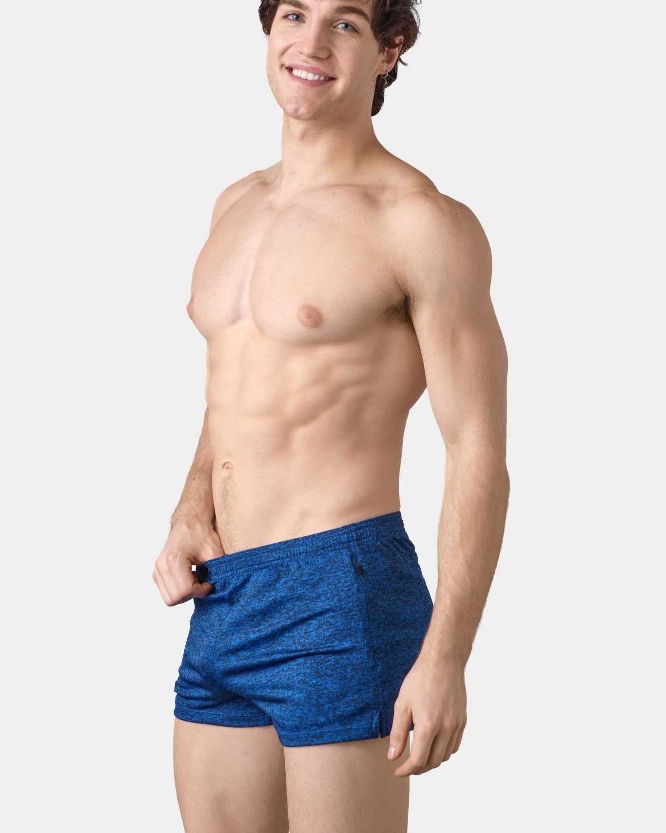 Awry Static Short Blue — close-up of static heather print fabric texture and rubber logo patch