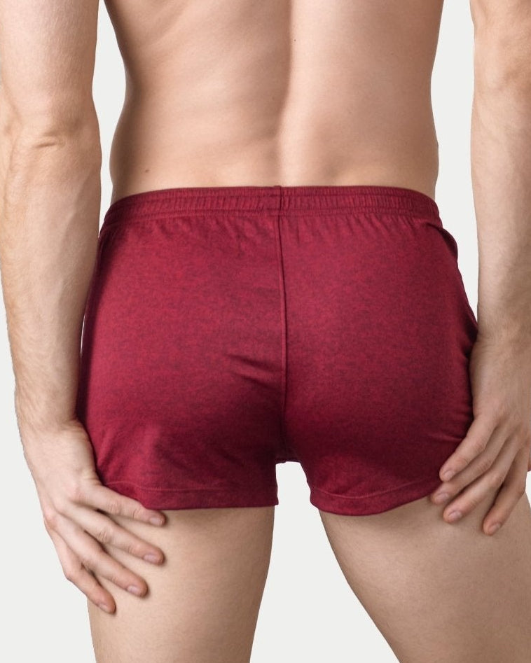Awry Static Short Red — side view showing hidden zipper pocket and clean elastic waistband