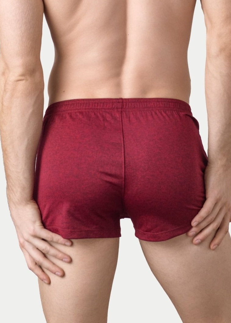 Awry Static Short Red — side view showing hidden zipper pocket and clean elastic waistband