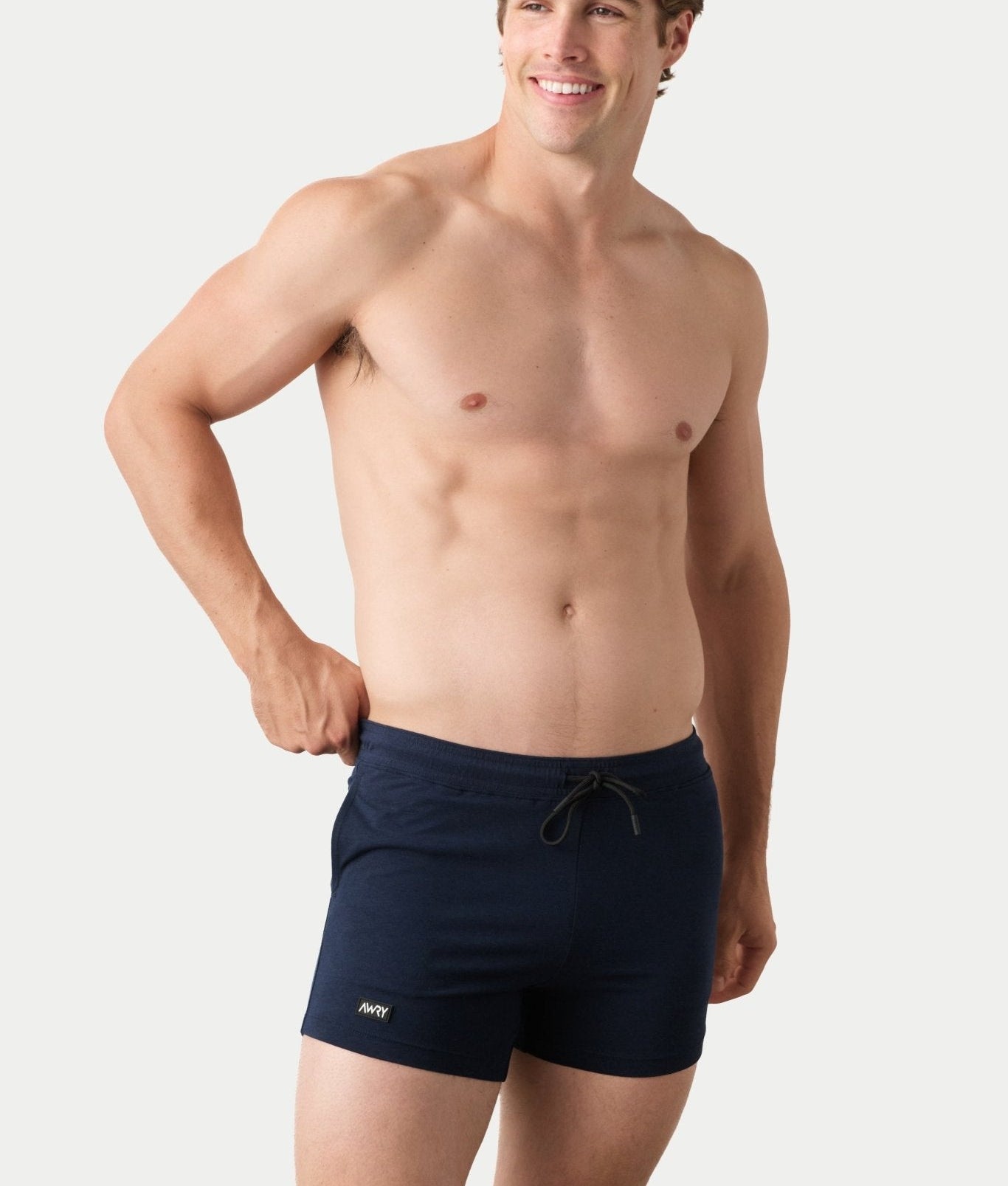 Awry Vers Short V2.1 Navy — side view showing roomy front pocket and drawstring waistband