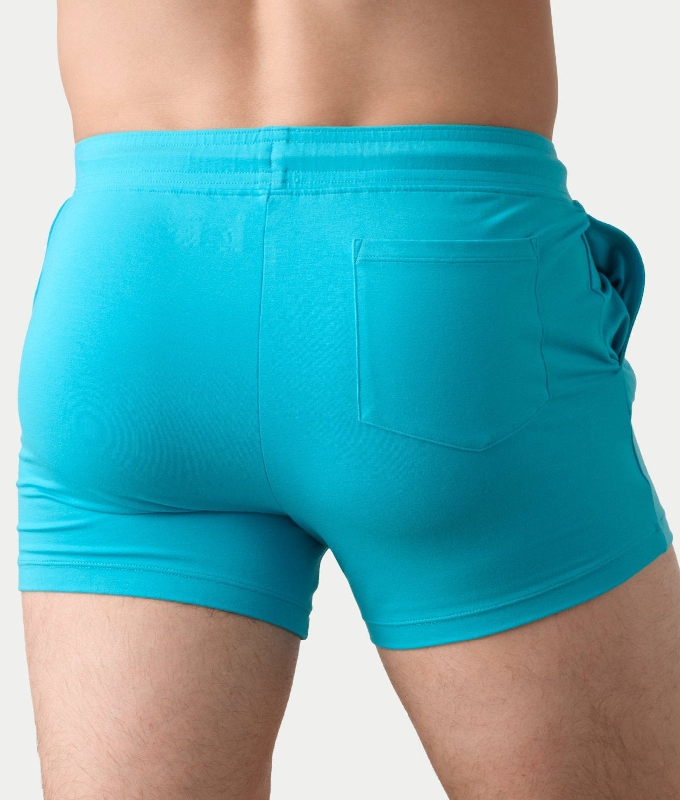 Awry Vers Short V2.1 Sky Blue — side view showing roomy front pocket and drawstring waistband