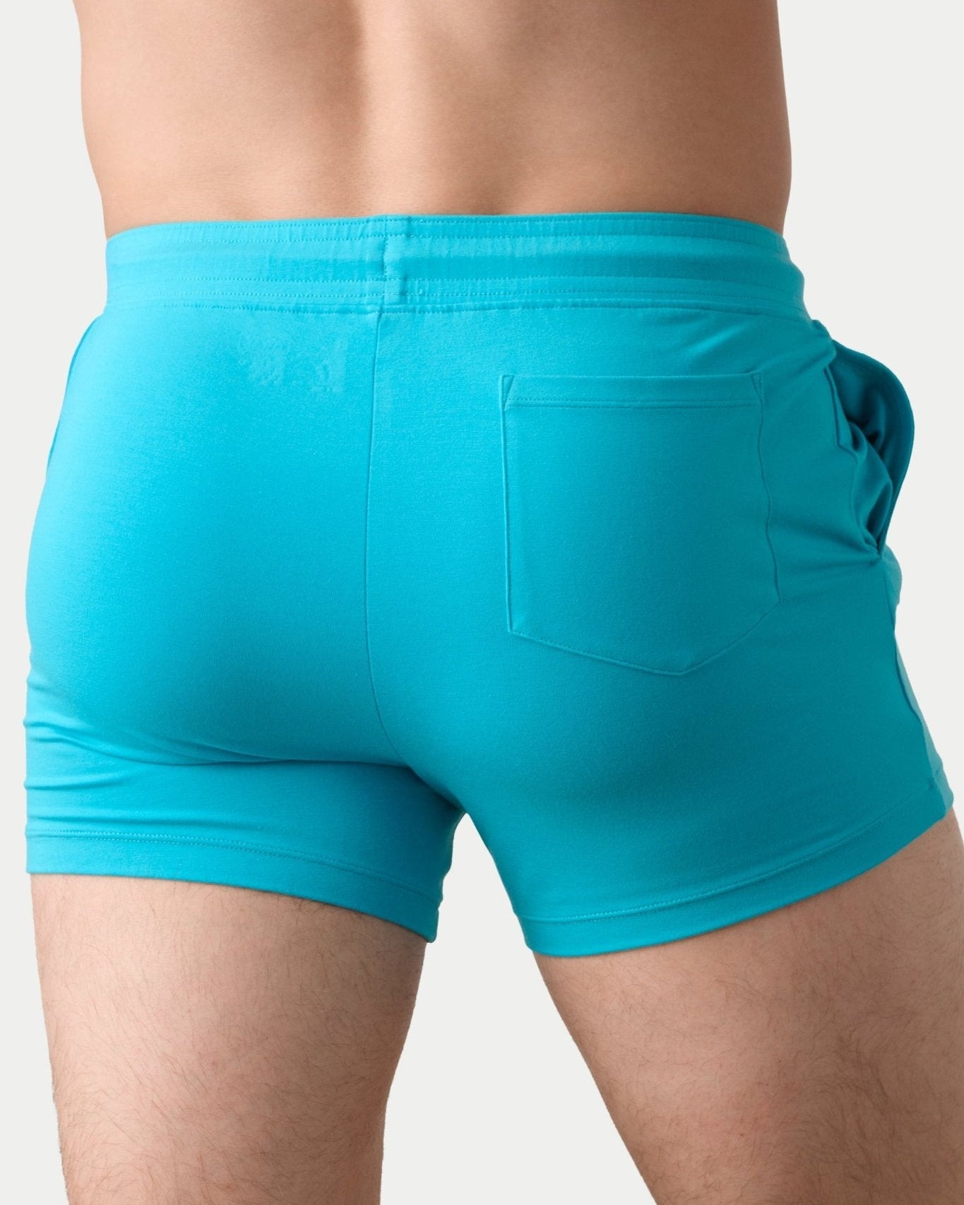 Awry Vers Short V2.1 Sky Blue — side view showing roomy front pocket and drawstring waistband