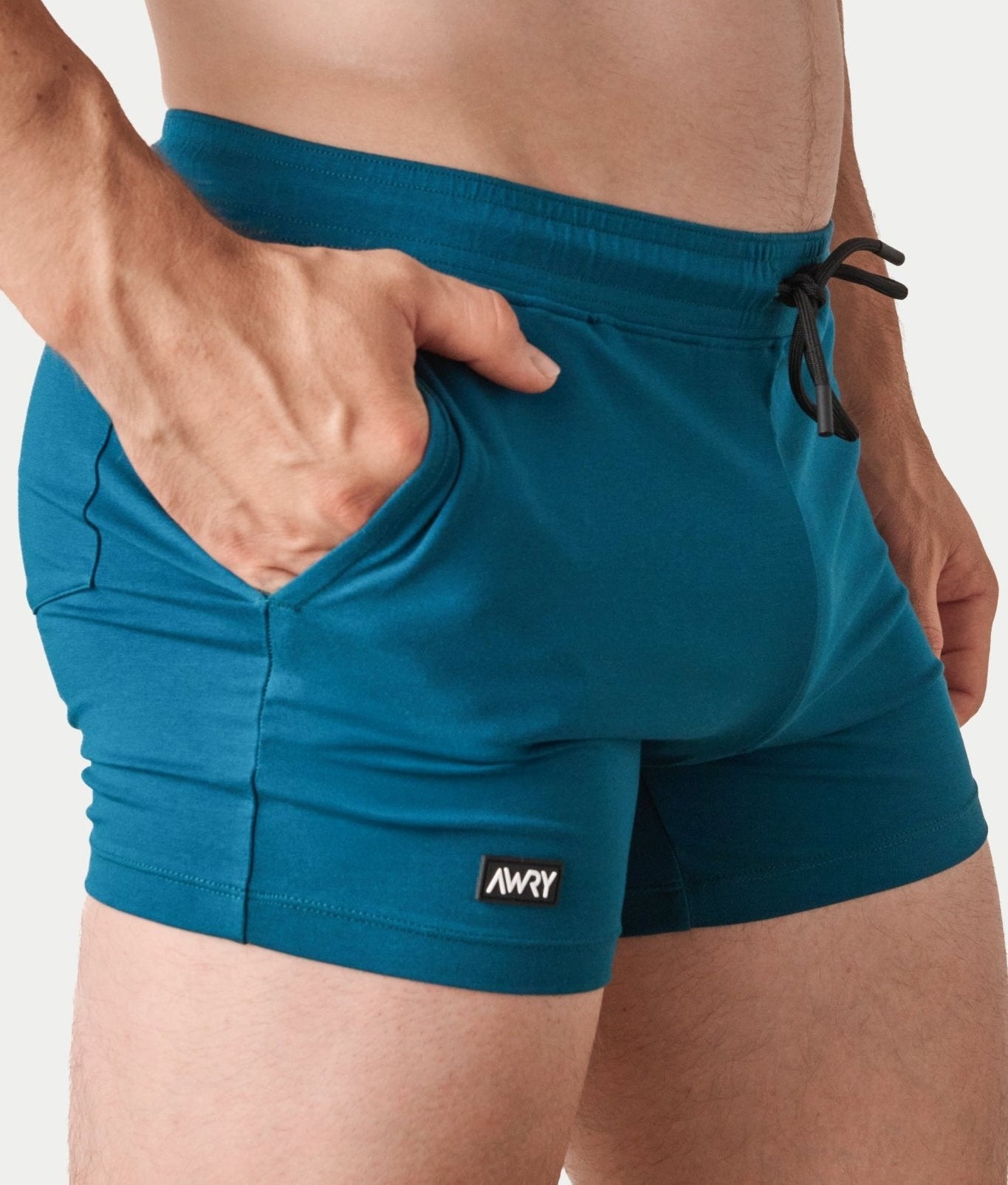 Awry Vers Short V2.1 Teal — rear view highlighting flattering glute-enhancing cut and high inseam