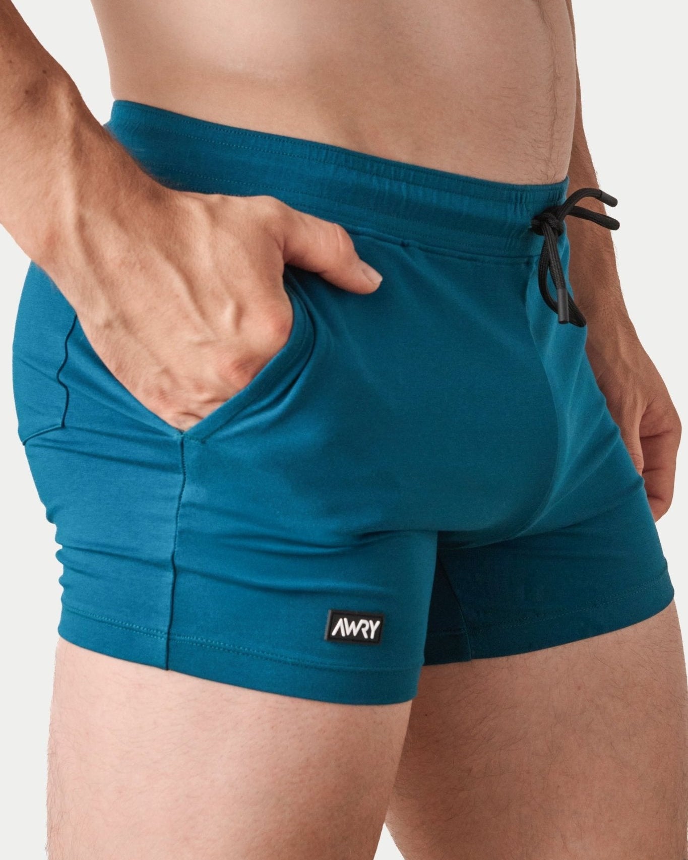 Awry Vers Short V2.1 Teal — rear view highlighting flattering glute-enhancing cut and high inseam