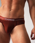 Teamm8 Icon Brief Cocoa - men's everyday brief laid flat, lifestyle shot