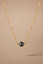 Etalon One Black Pearl Necklace - close-up of rare black freshwater pearl and chain detail
