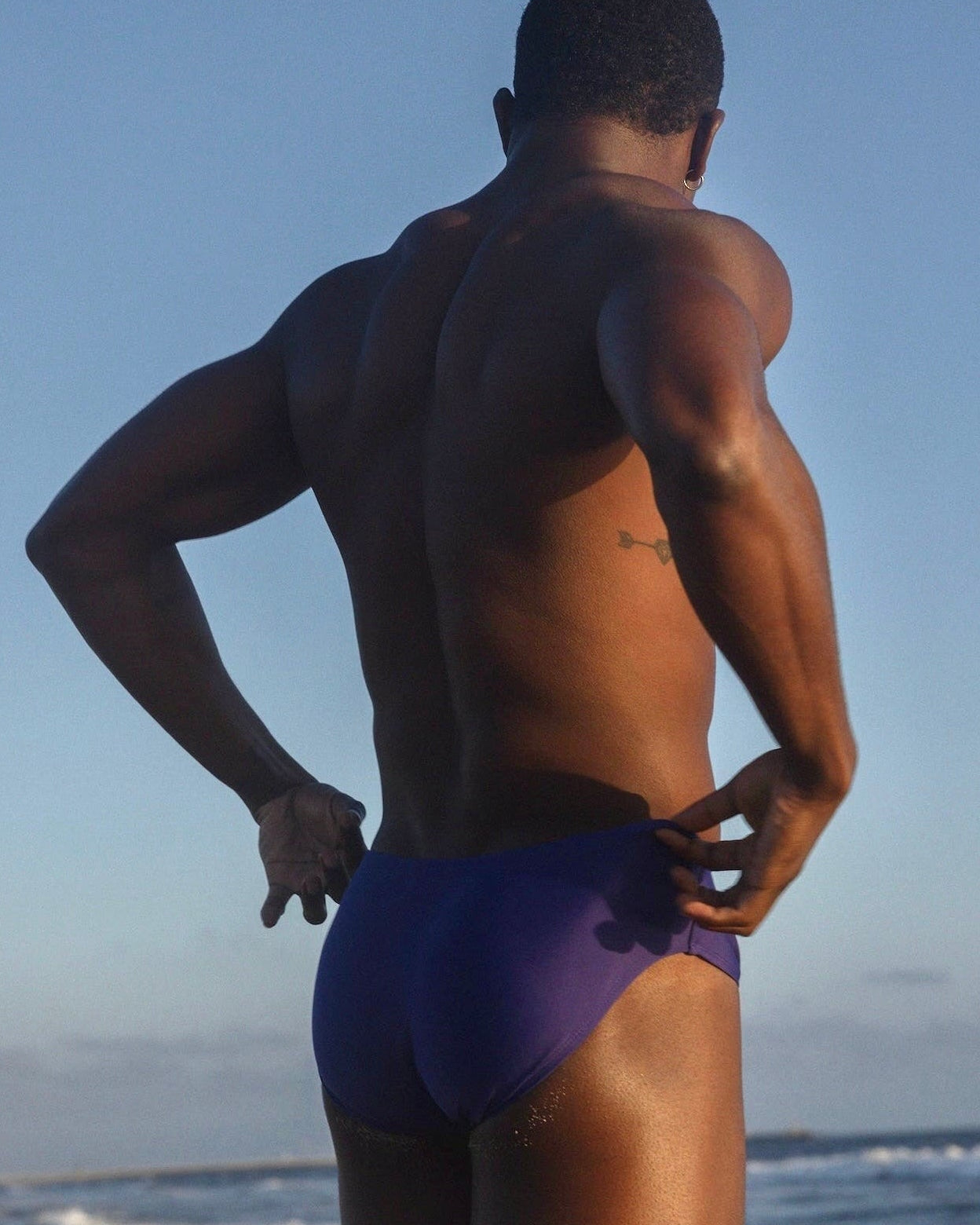 Sean & Val Classic Brief Indigo — men's swim brief, model 3/4 front view