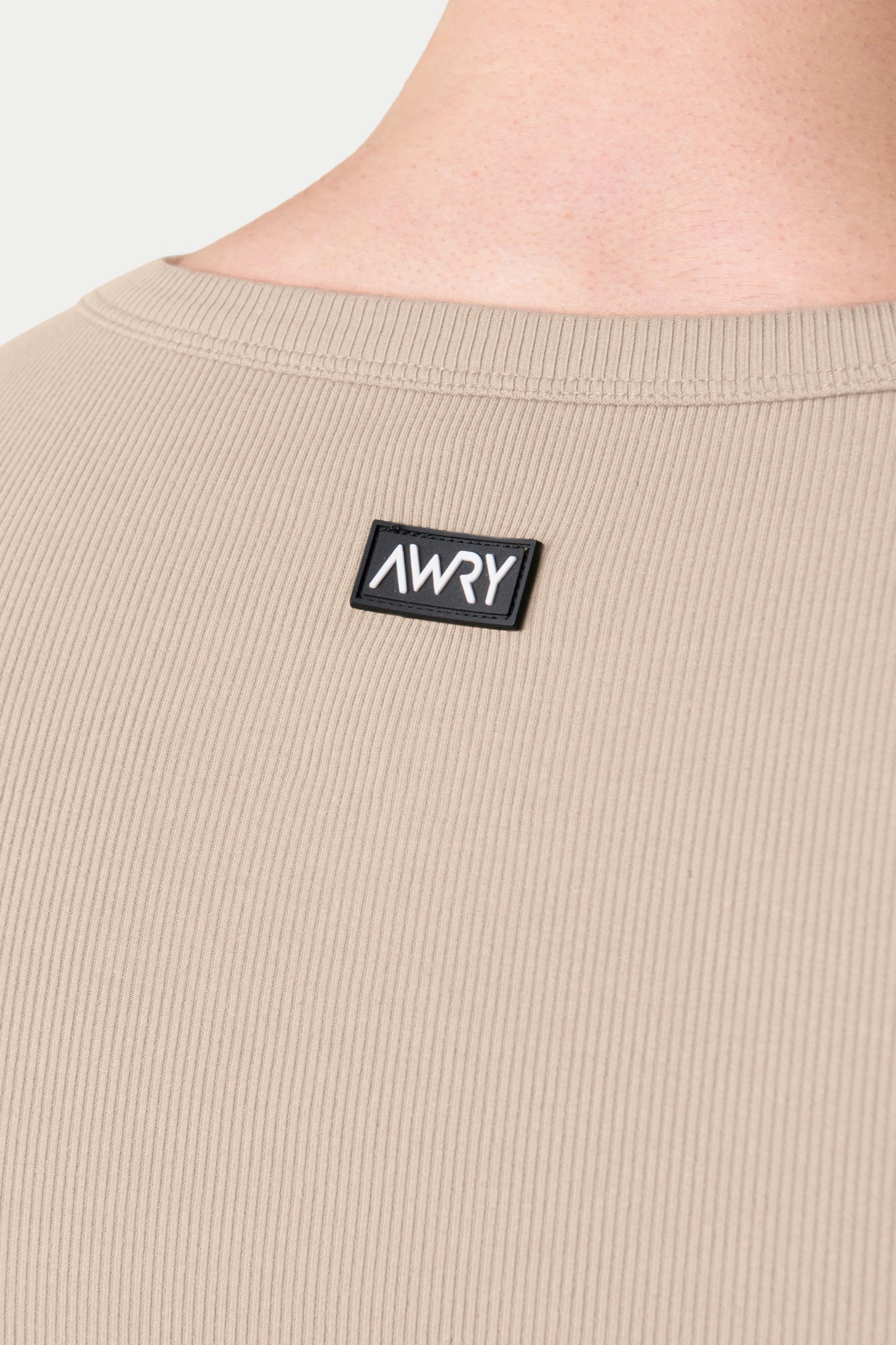 Awry Ribbed Tank Sand — men's sleeveless tank top lifestyle styling