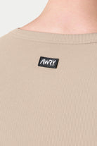 Awry Ribbed Tank Sand — men's sleeveless tank top lifestyle styling