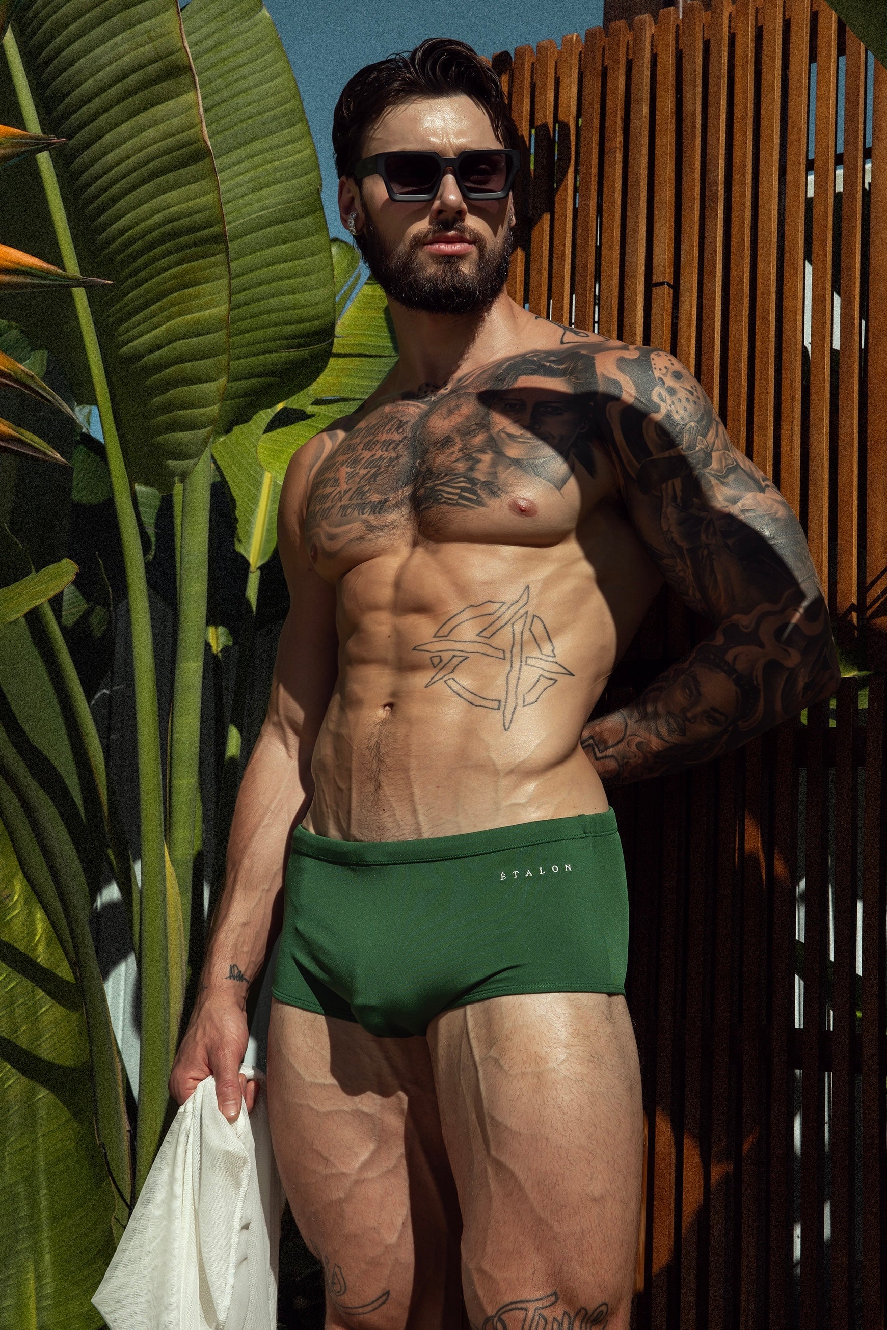 Étalon Olive Swim Sunga - men's Brazilian swimwear, lifestyle beach shot