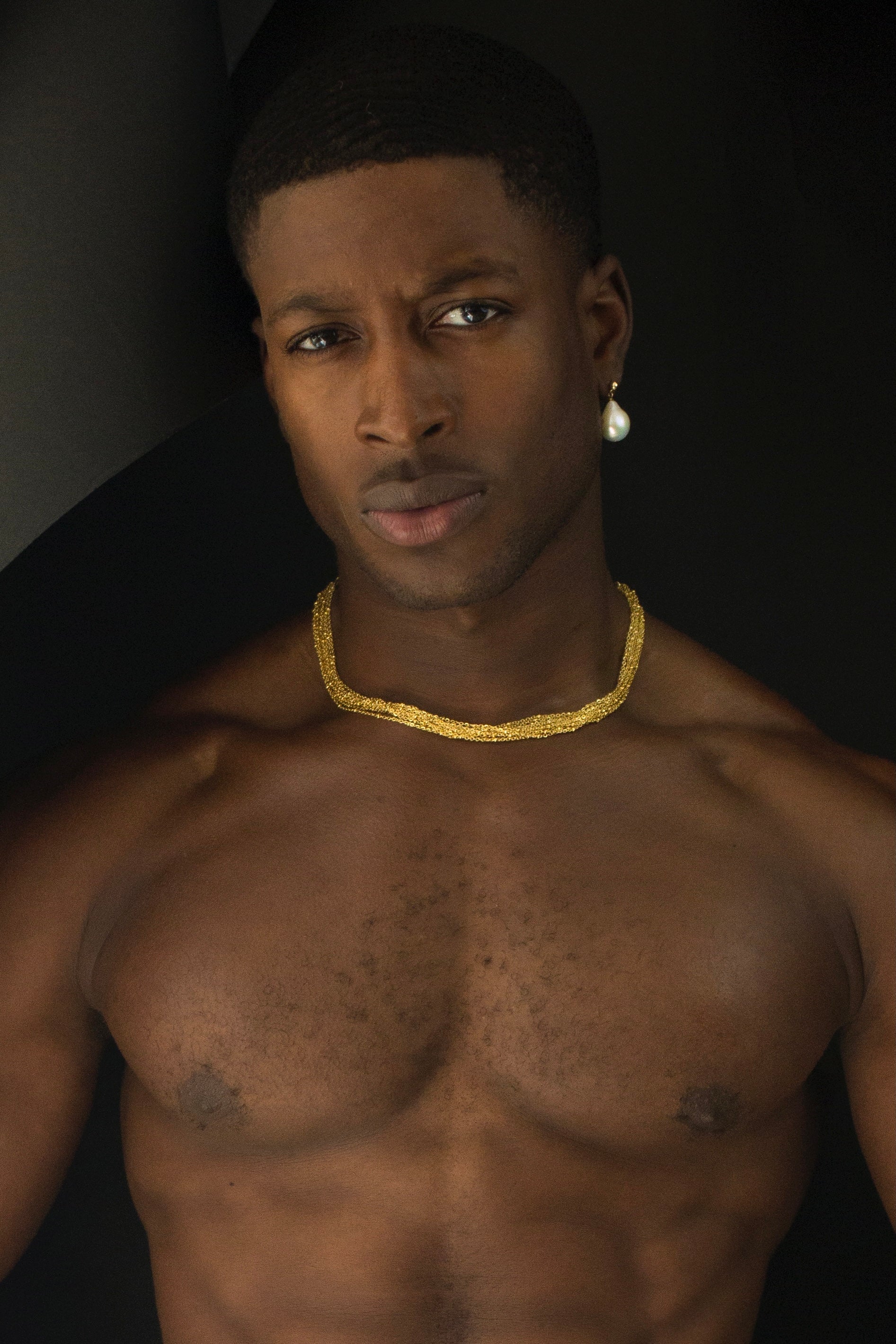 Etalon Infinity Chain - men's layered necklace worn on model, styled with open collar