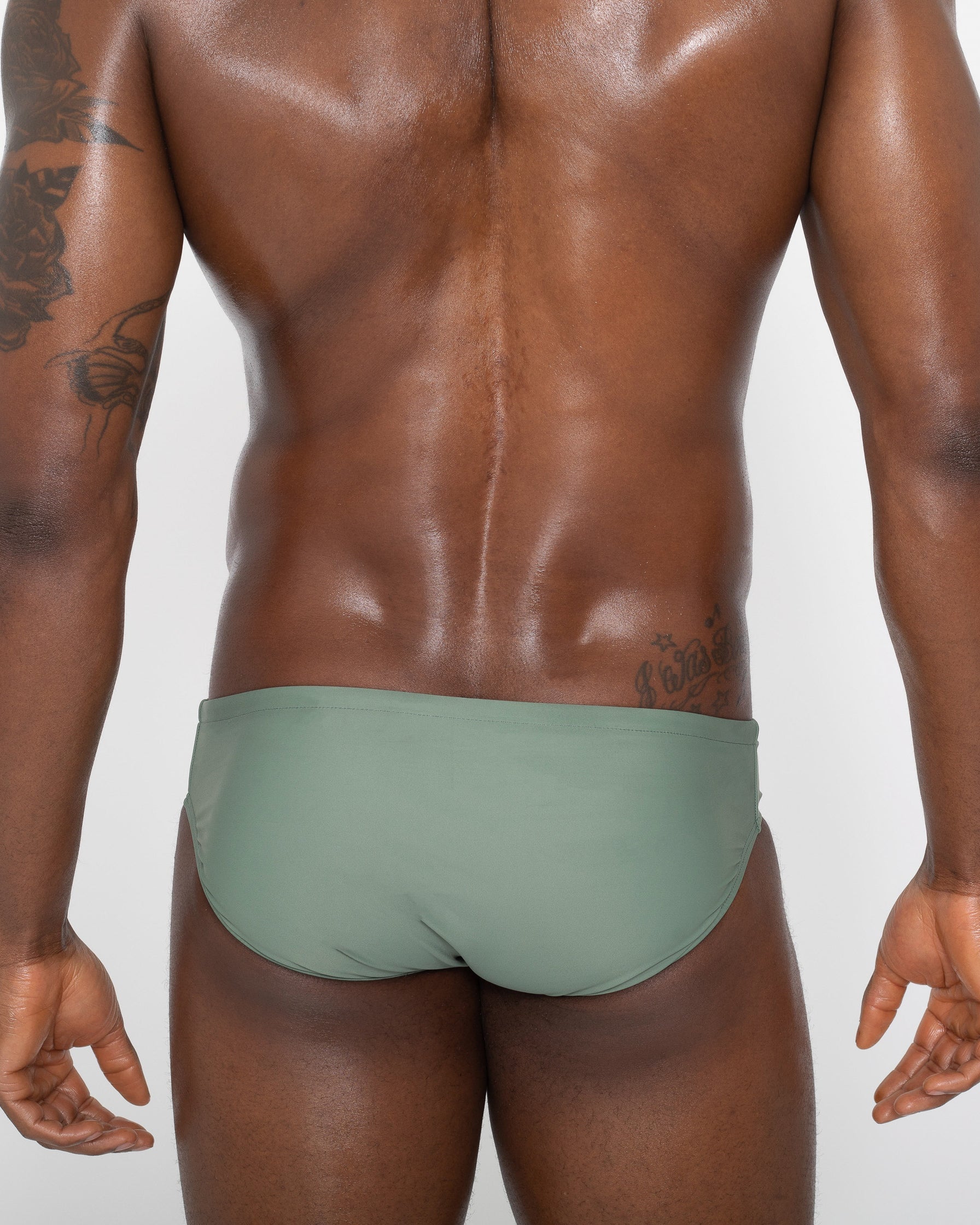 Sean & Val Classic Brief Sage — men's swim brief back view showing minimal coverage