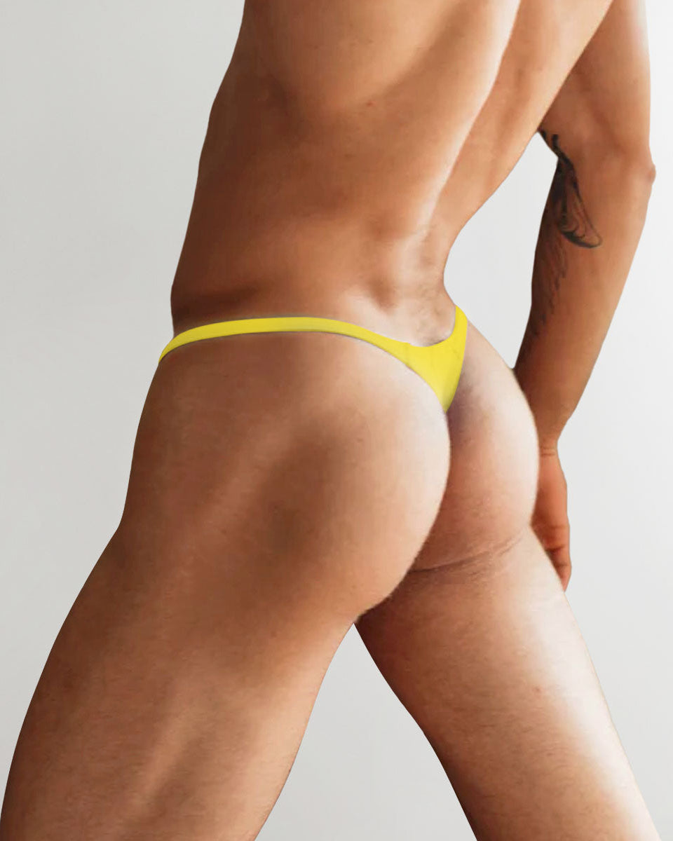 Etalon by Steve Canar Neon Thong product shot — 2026 color-matched woven tag