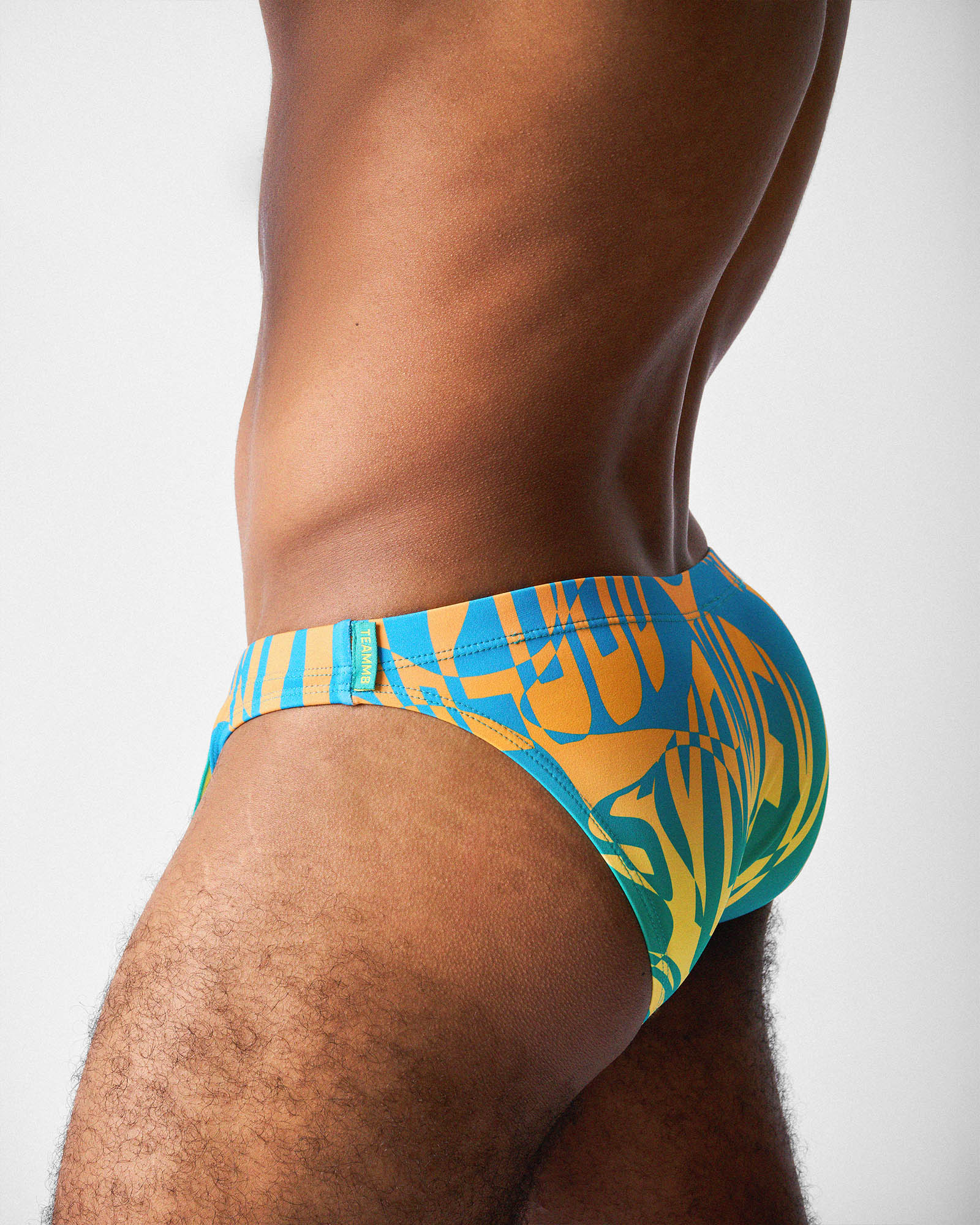 Teamm8 Harbour City Bikini Swim Brief Tropical - men's bikini swim brief poolside, side view
