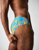 Teamm8 Harbour City Wide Swim Brief Tropical - men's wide swim brief poolside, side view