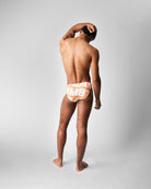 Teamm8 Headliner Bikini Swim Brief Orange - men's orange logo print swim brief, full body