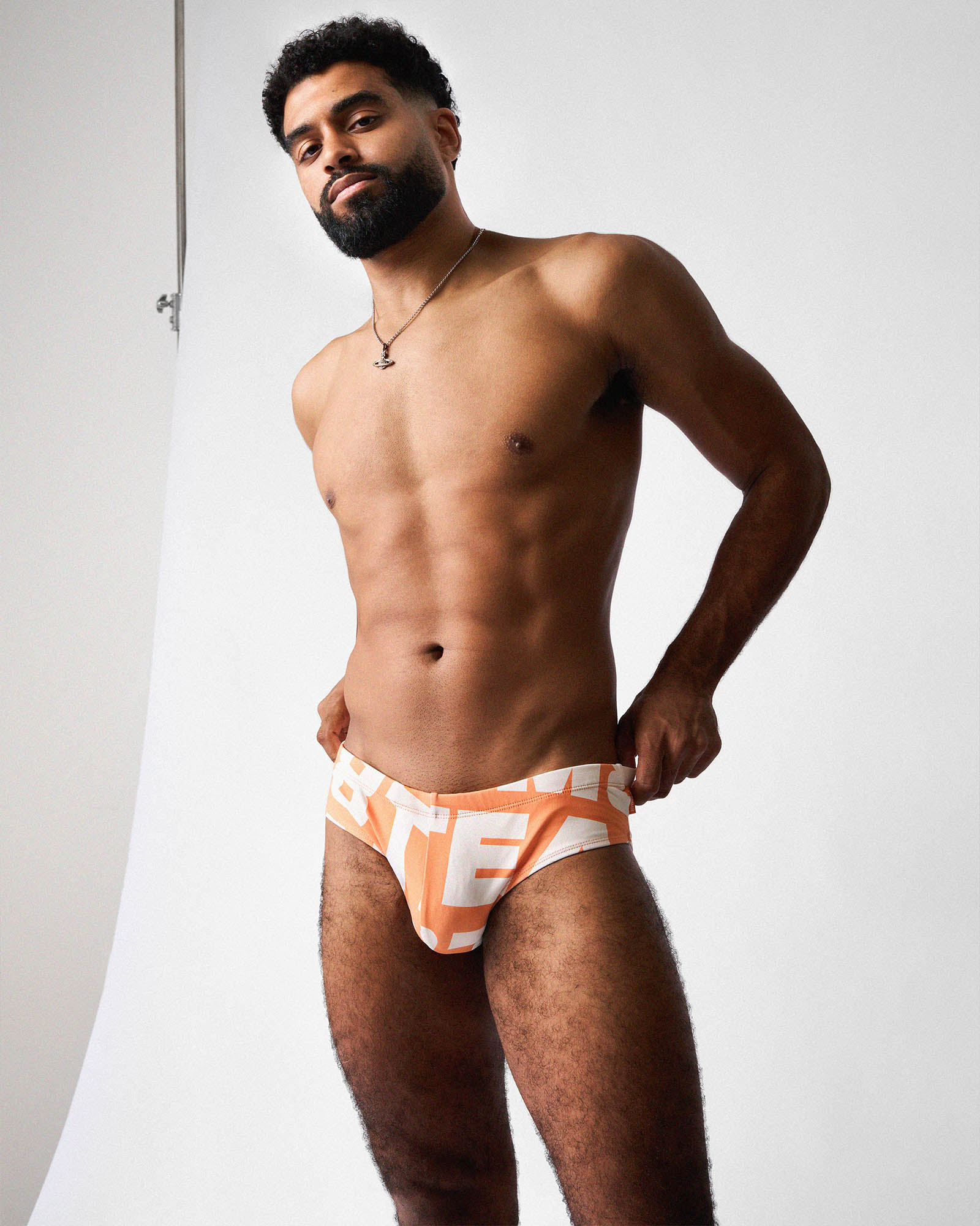 Teamm8 Headliner Wide Swim Brief Orange - men's deconstructed logo print swim brief, lifestyle