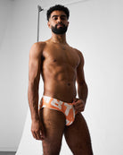 Teamm8 Headliner Wide Swim Brief Orange - men's swim brief flat lay, full product view