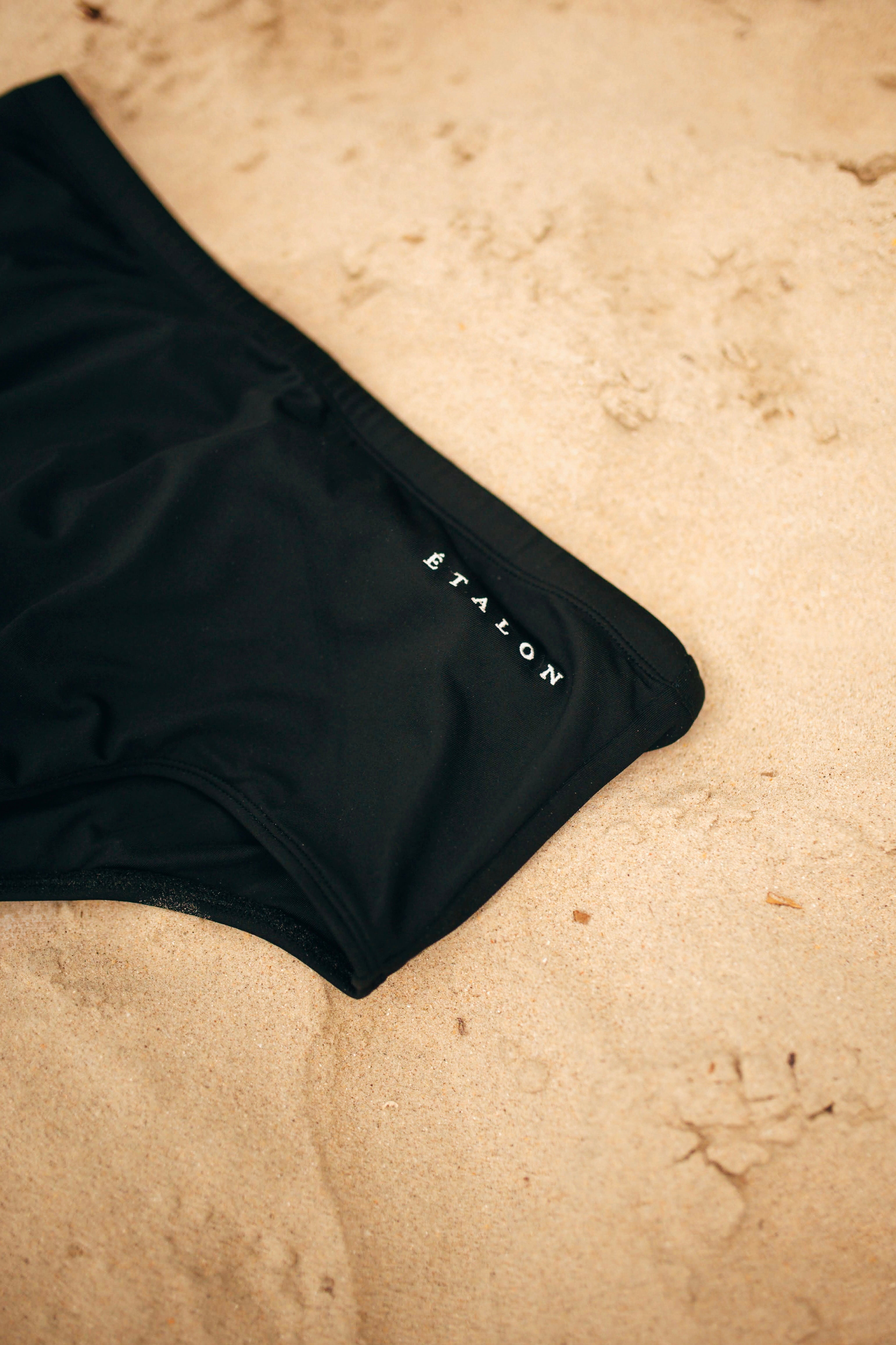 Étalon Black Swim Sunga - men's Brazilian swimwear product flat lay