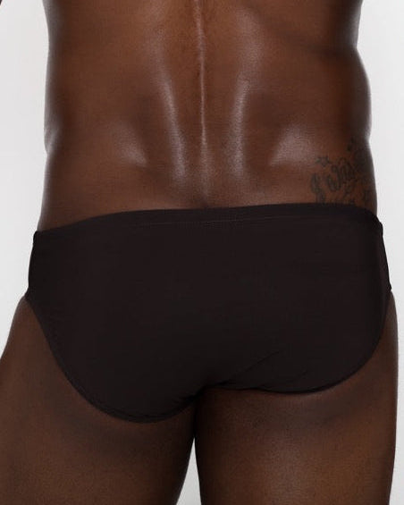 Sean & Val Classic Brief Black — men's swim brief lifestyle shot at beach or pool