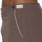 Parke & Ronen Catalonia Espresso Stretch Swim Short - close-up of accent waist tab detail