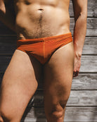Sean & Val Ribbed Racer Brief Terracotta — ribbed swim brief front detail and liner view