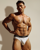 Reputation Brief 01 Signature Cut White - men's low-rise brief, side view lifestyle