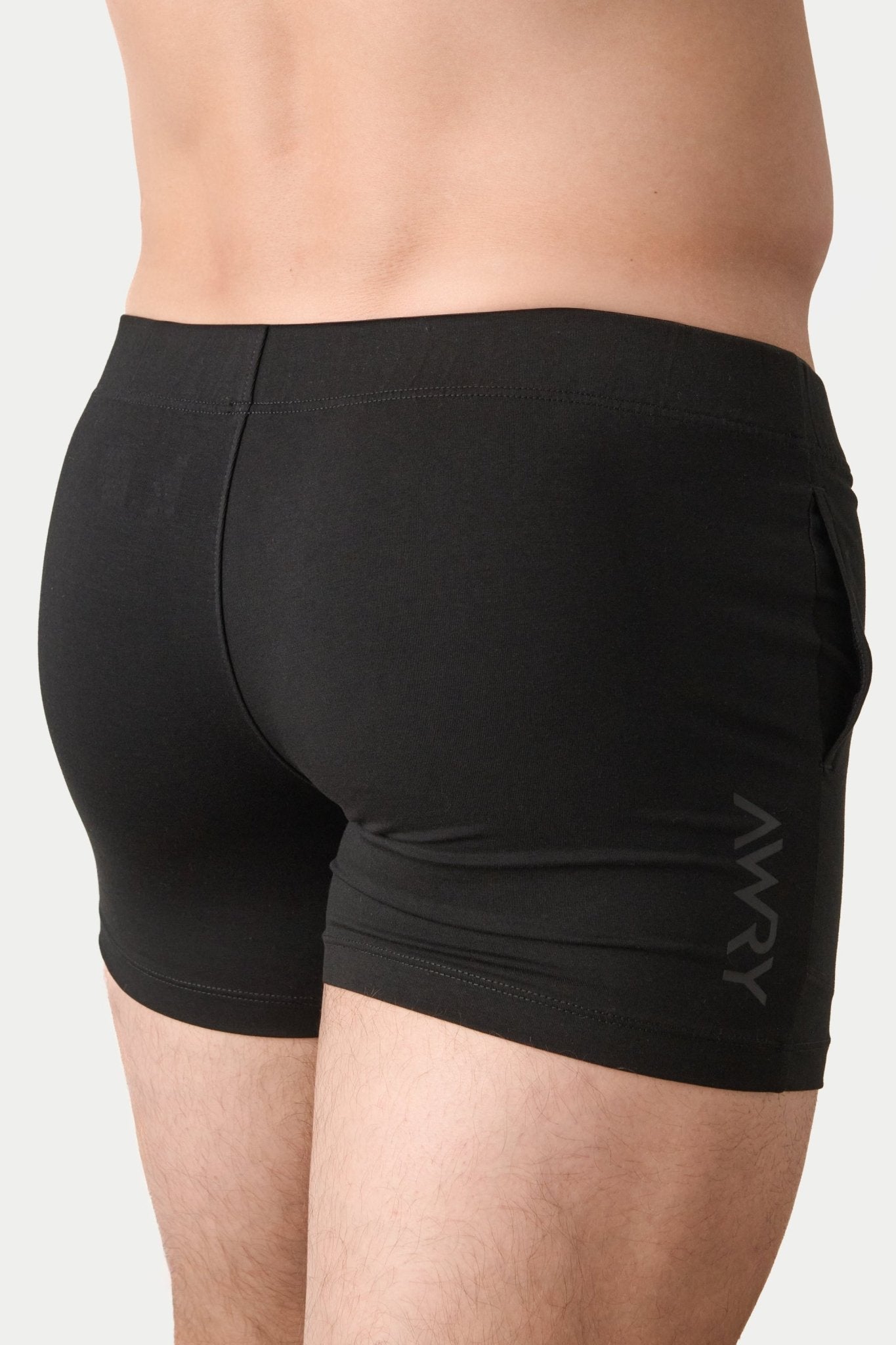 Awry Flow 4 Inch Short V2 Black — side view showing roomy front pocket and smooth waistband