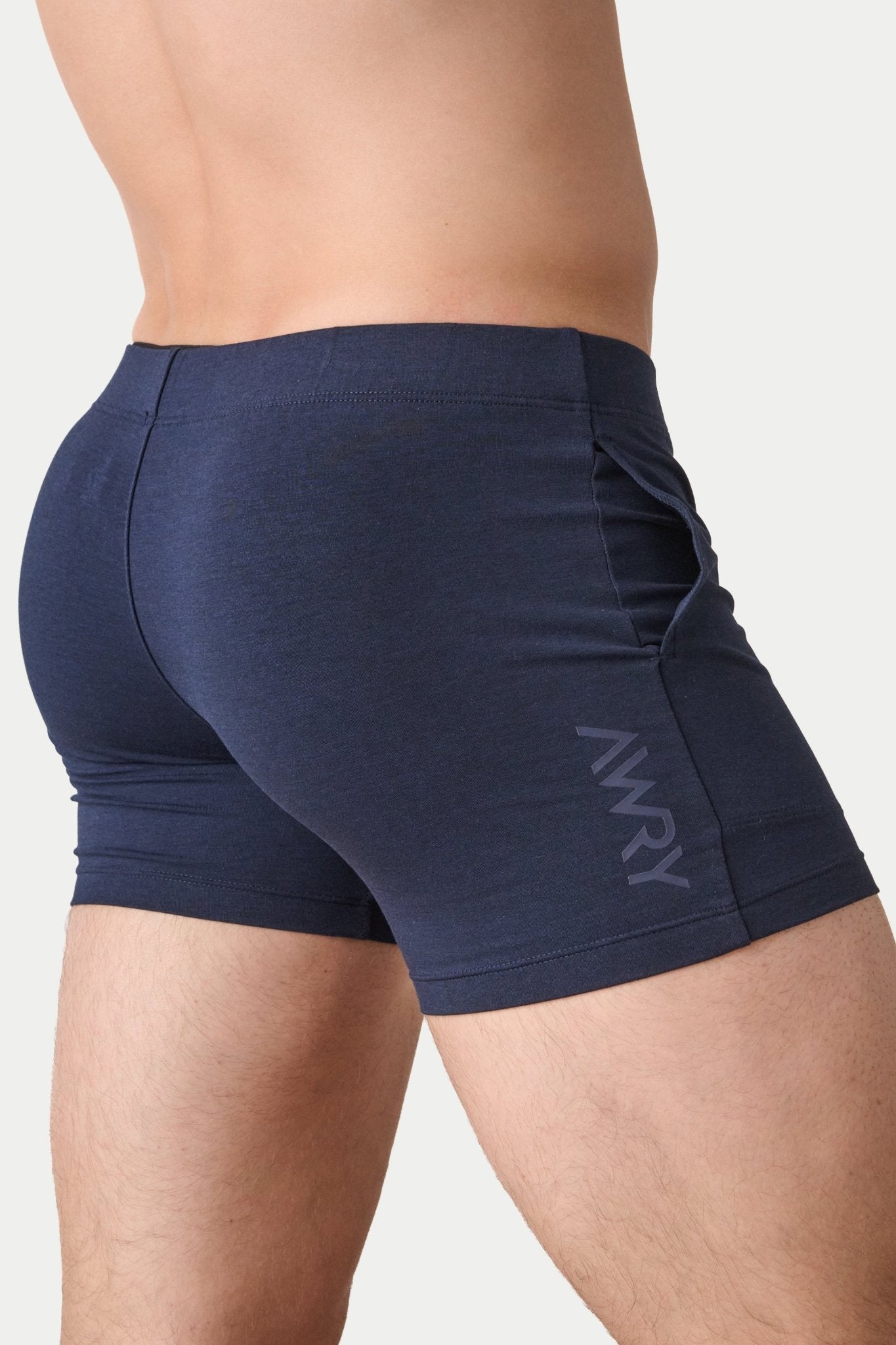 Awry Flow 4 Inch Short V2 Navy — side view showing roomy front pocket and smooth waistband