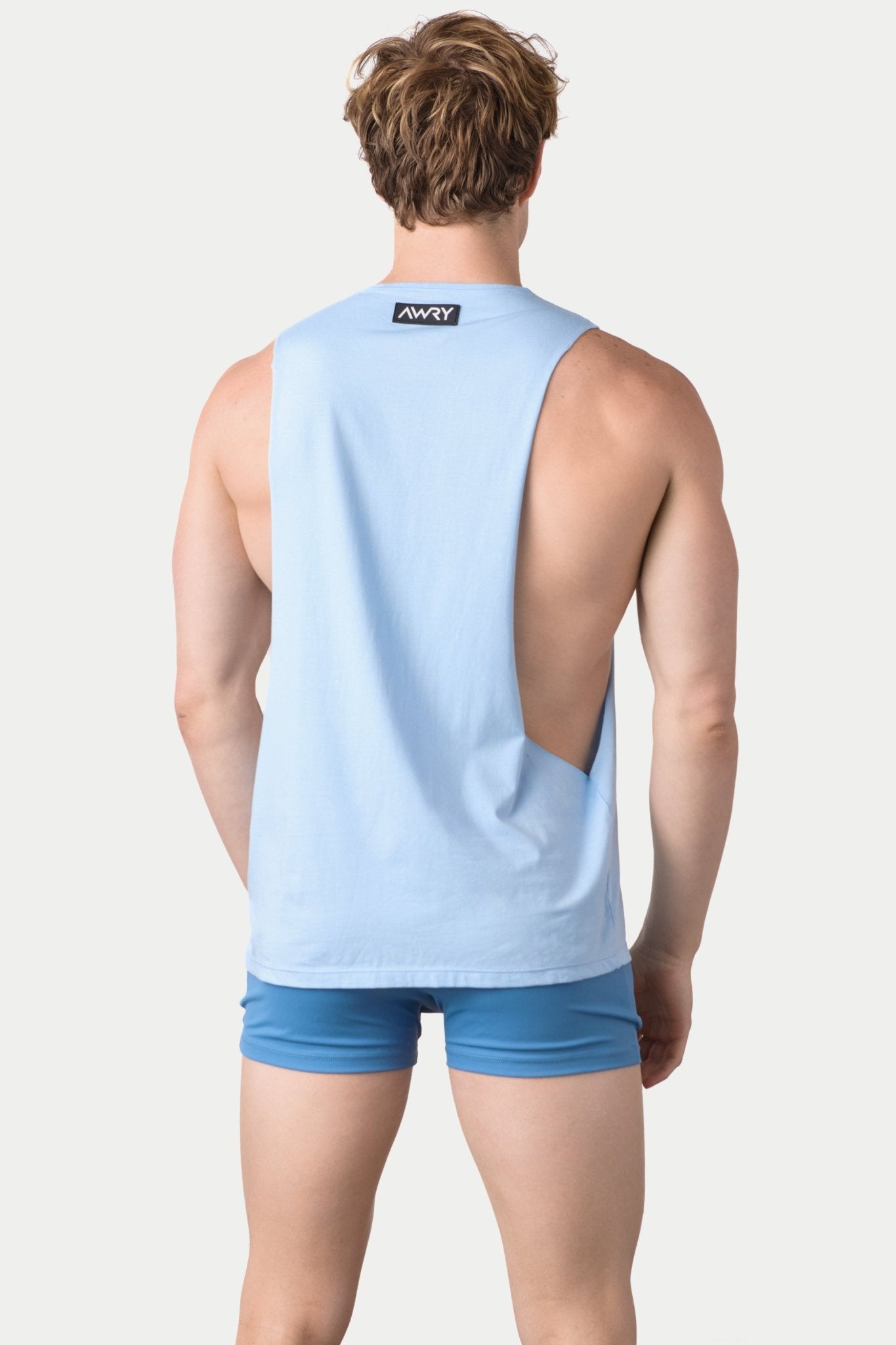 Awry Impact Tank Frost — side view showing deep armhole cutout and relaxed draped silhouette