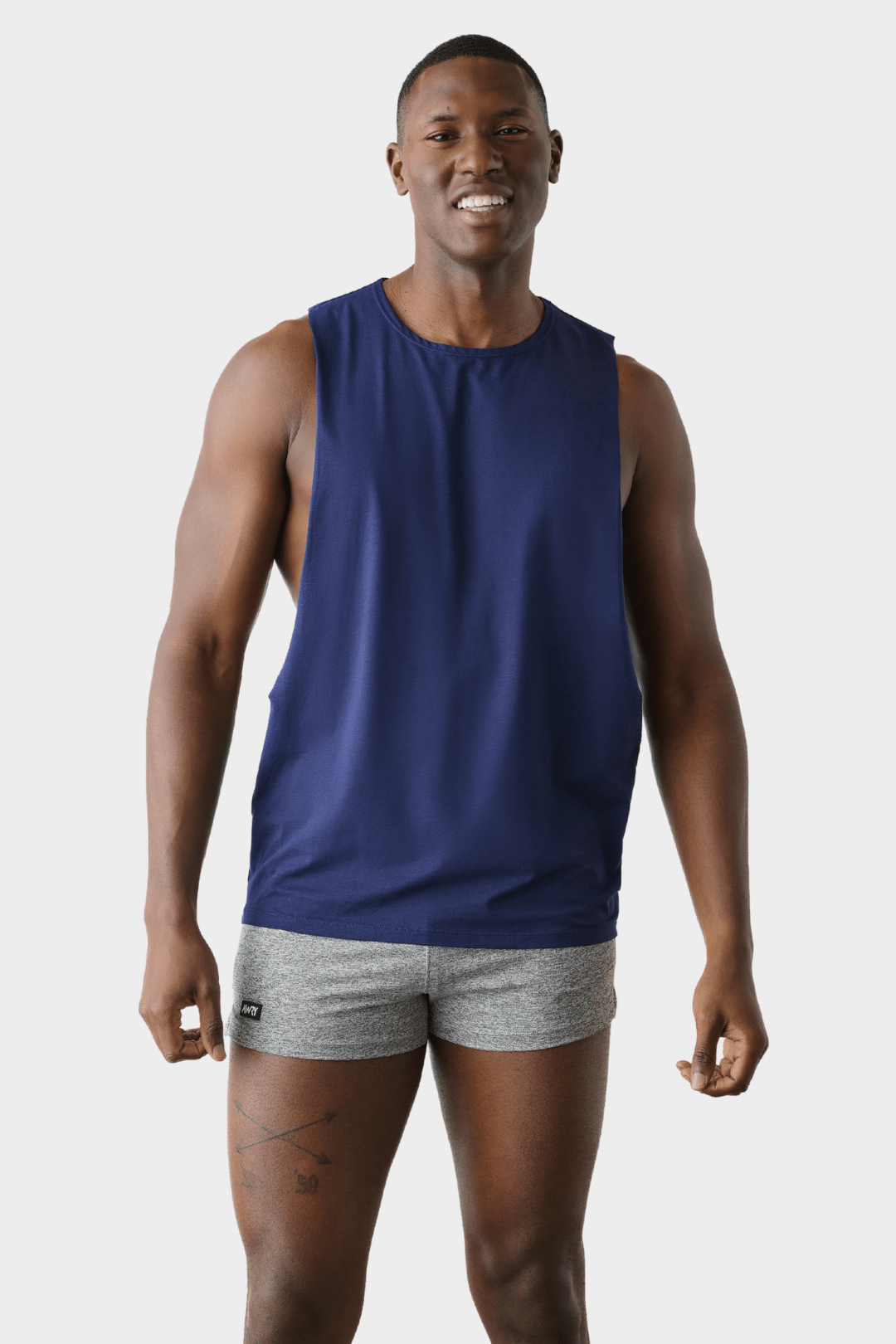 Awry Impact Tank Navy — men's cotton-modal activewear tank with deep side cutouts, front view