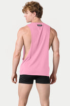 Awry Impact Tank Pink — side view showing deep armhole cutout and relaxed draped silhouette
