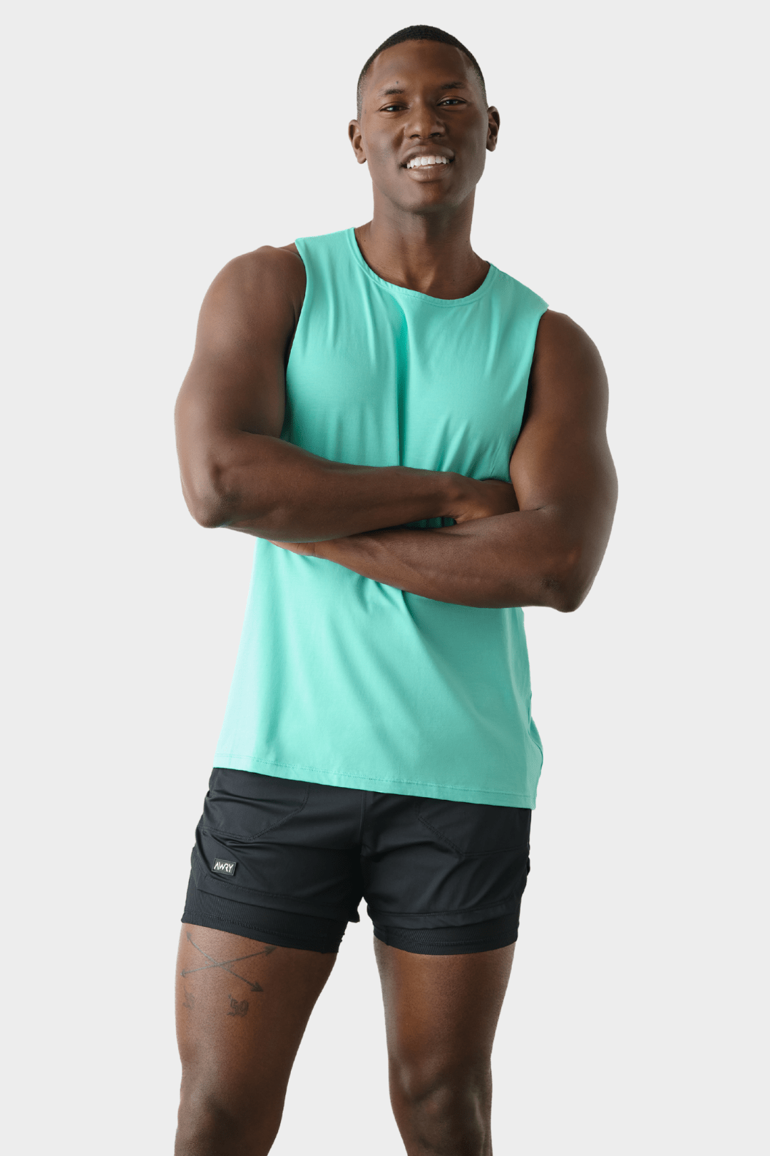 Awry Impact Tank Turquoise — close-up of organic cotton-modal fabric texture and drape