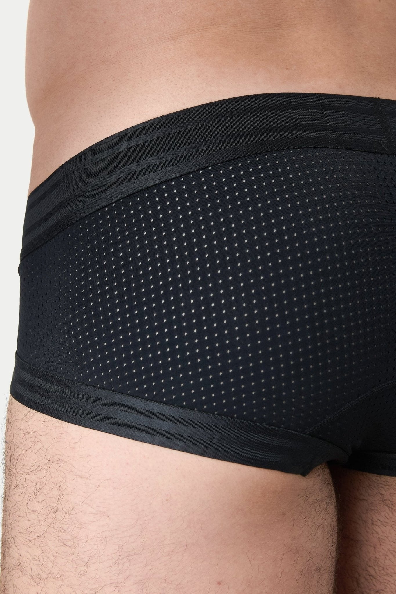 Awry Lift Brief Black — rear view showing built-in jockstrap strap system and lift construction