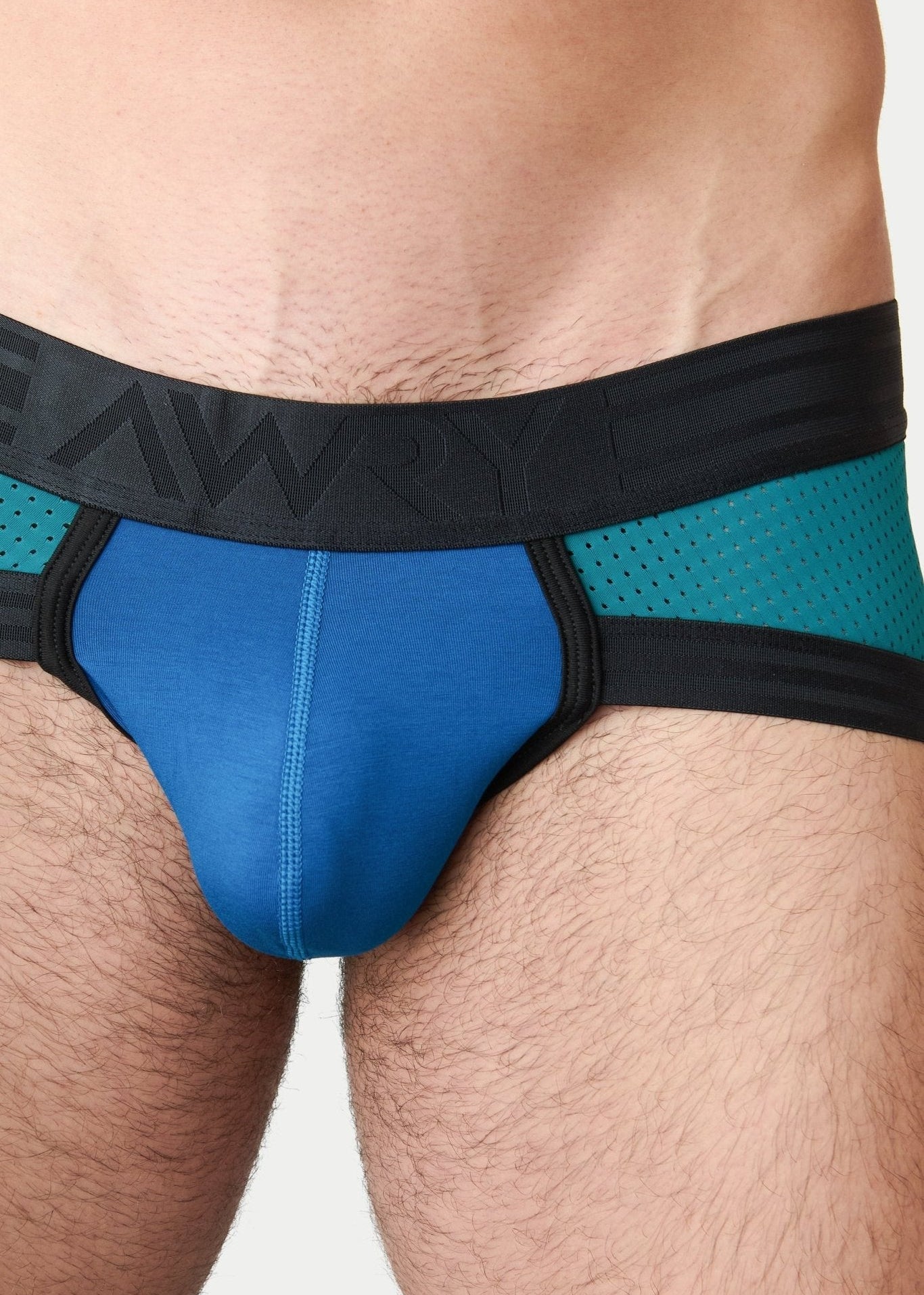 Awry Lift Brief Blue Lagoon — side profile showing 2-ply front pouch and low-rise brief cut