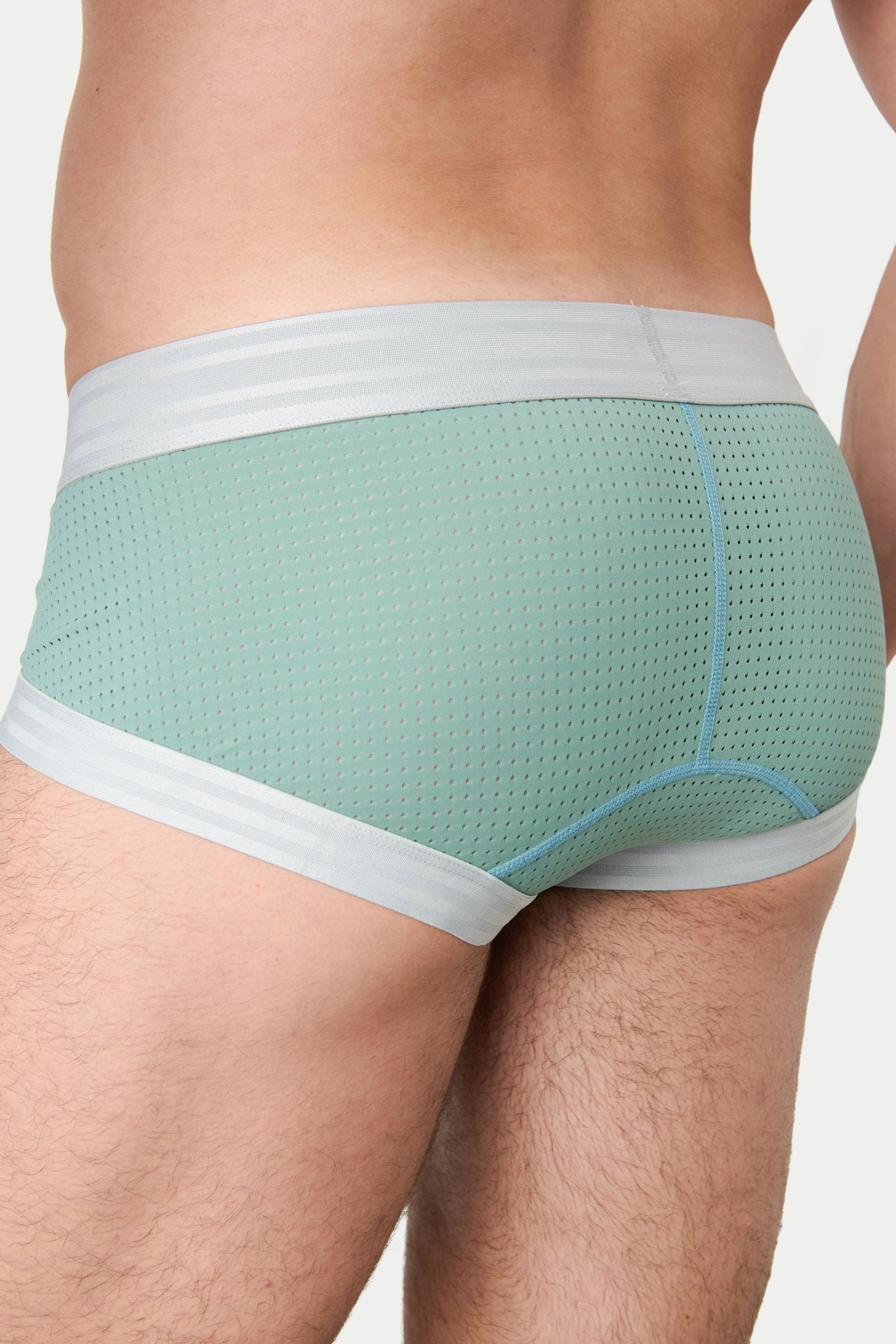 Awry Lift Brief Sea Foam — rear view showing built-in jockstrap strap system and lift construction