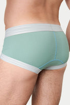 Awry Lift Brief Sea Foam — rear view showing built-in jockstrap strap system and lift construction