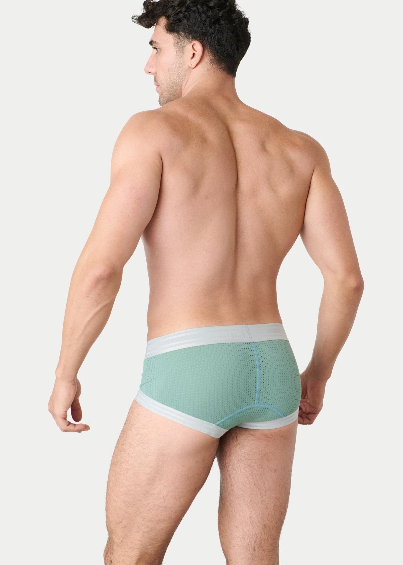 Awry Lift Brief Sea Foam — detail shot of branded waistband and 4-way stretch mesh fabric