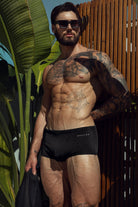 Étalon Black Swim Sunga - men's swim brief worn poolside, full body front