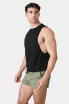Awry Raw Crop Tank Black — close-up of raw unfinished edge at collar and armhole