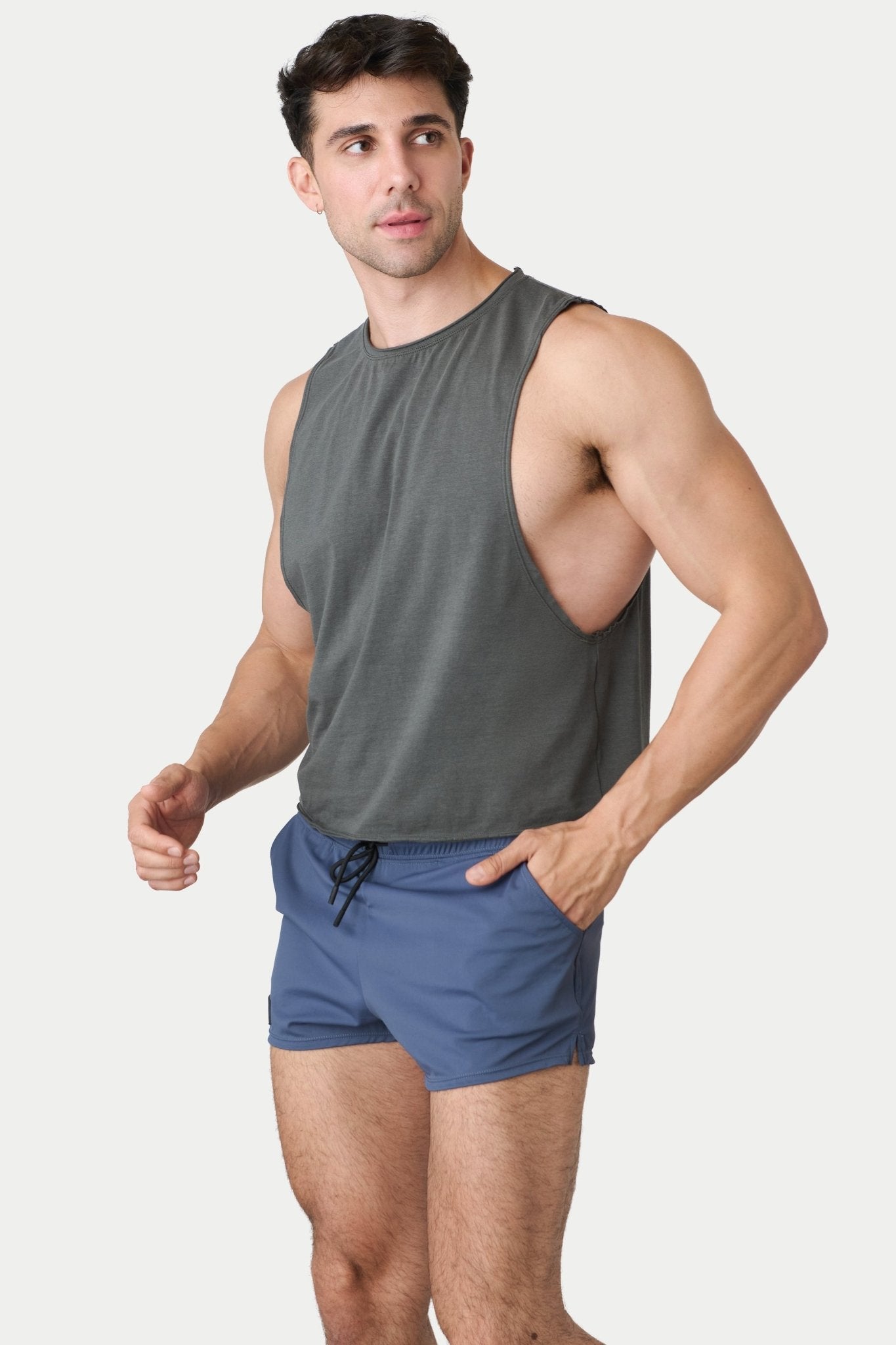 Awry Raw Crop Tank Charcoal — rear view showing open back and raw hem edge detail